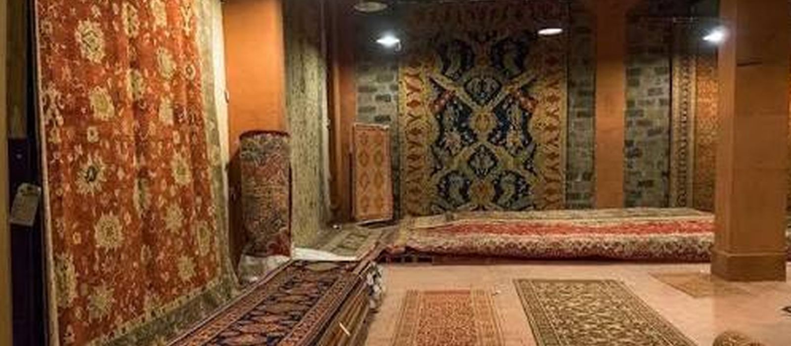 Carpets and rugs displayed in a showroom